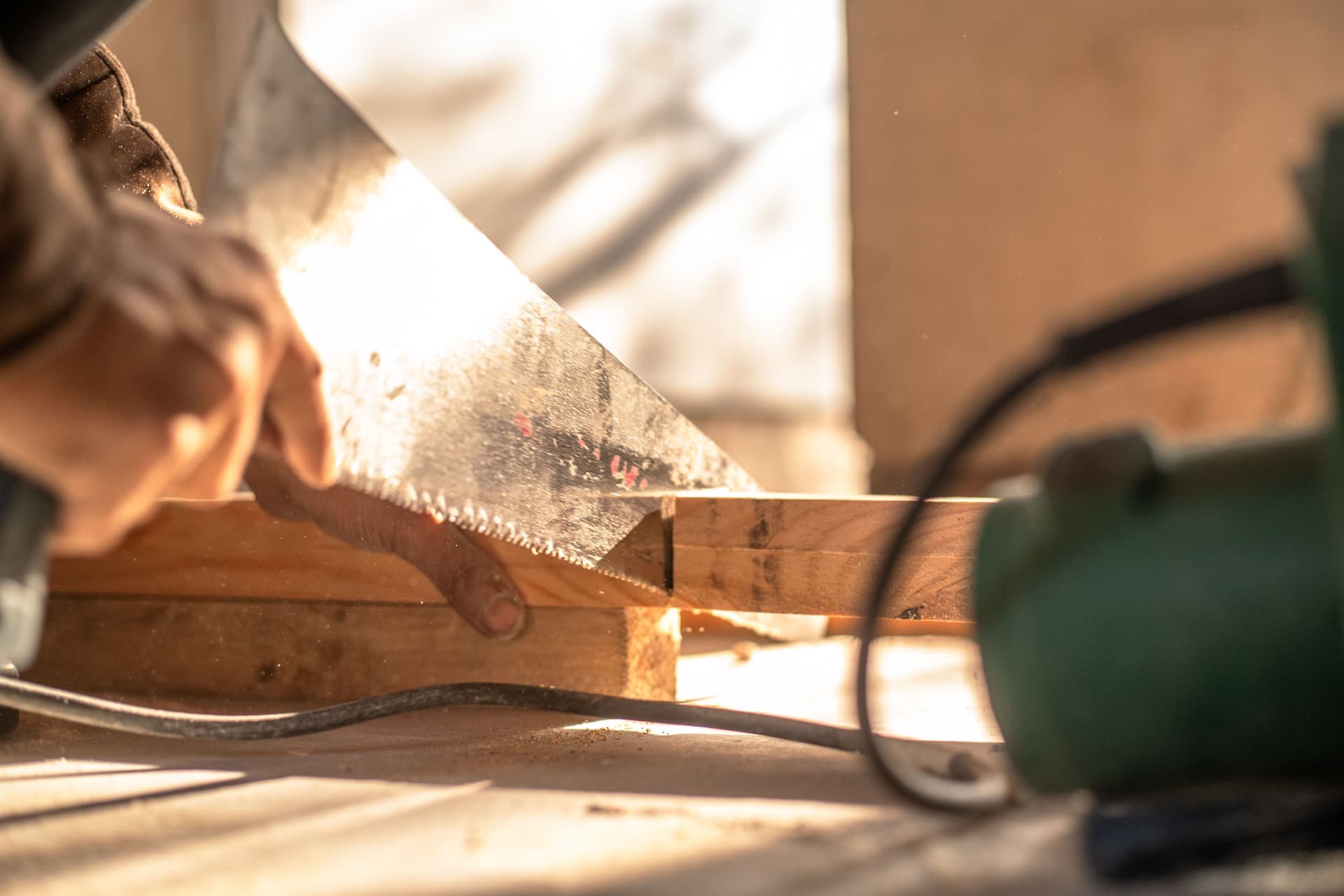 Framing lumber and a carpenter's tools on a build site